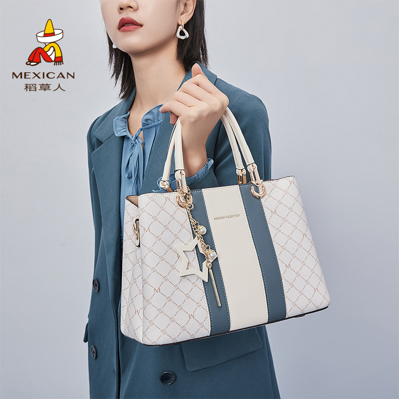母亲节礼物稻草人包包女新款斜挎包手提包中年小众妈妈包通勤女包 90元